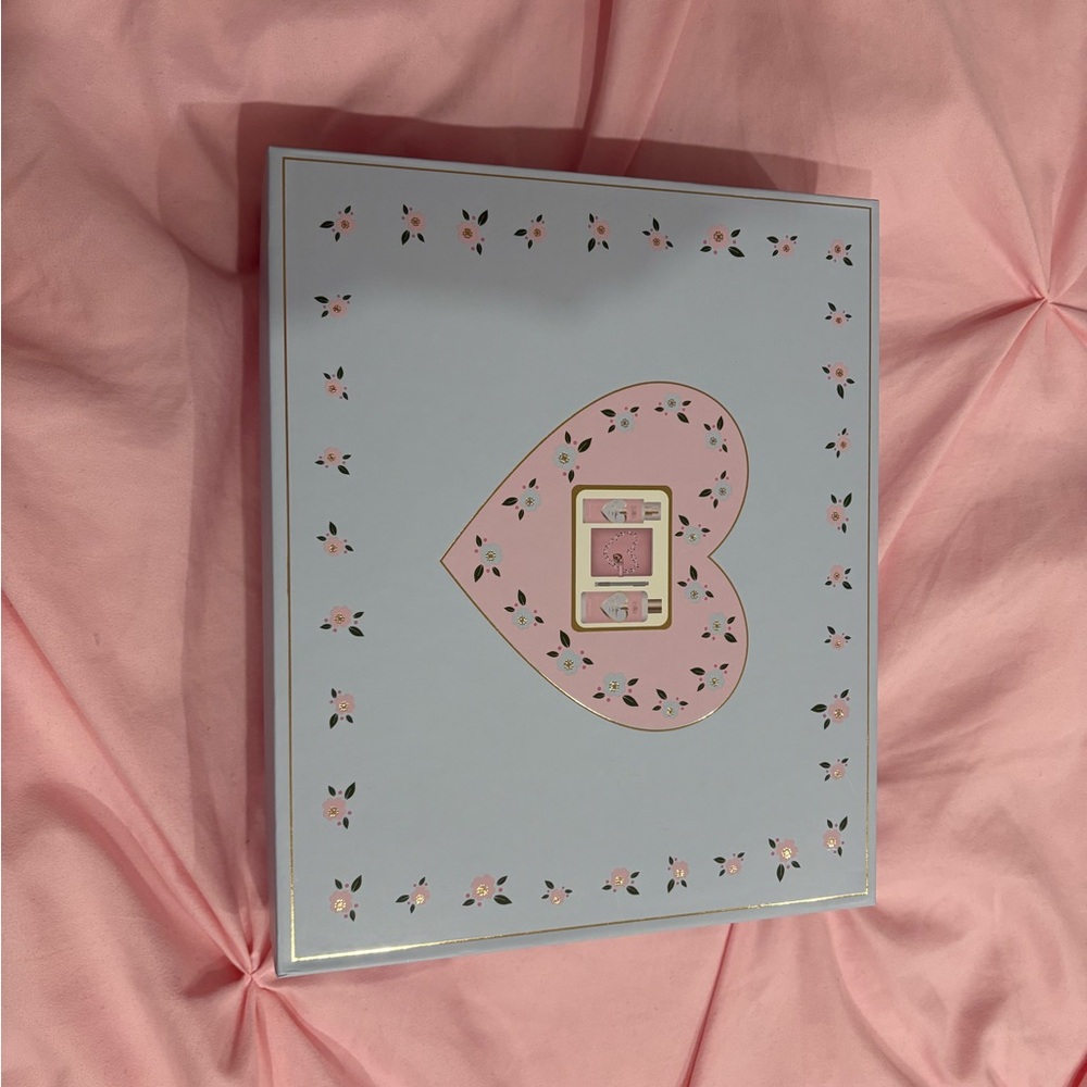 Floral Gift box with perfume, body wash, and notebook with a key